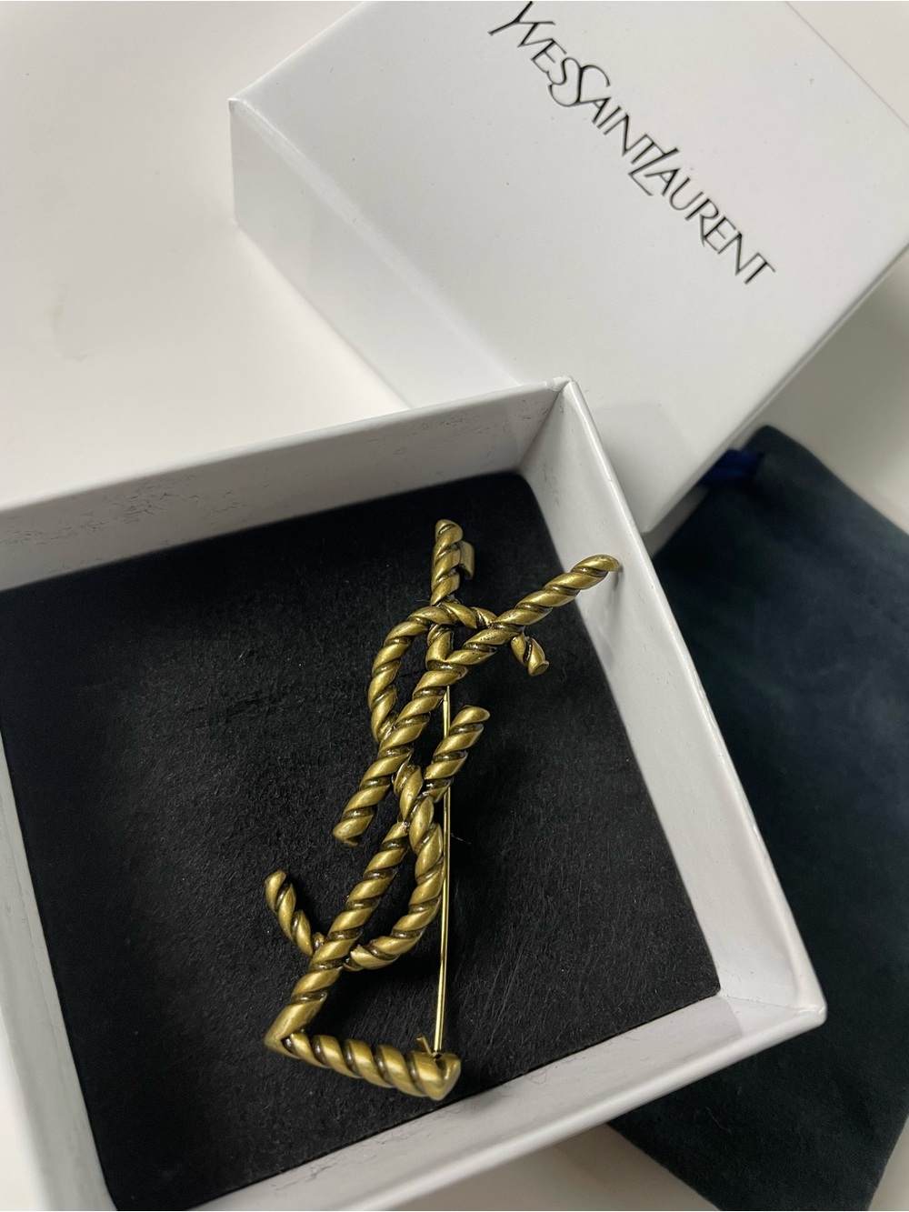 Yves Saint Laurent Twisted Rope Logo Brooch in Brass Gold